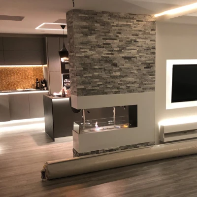 Brûleur 5L en acier inoxydable. Durée de combustion prévue de 5 heures. Dimensions: H: 16 x l: 100 x p: 8 cm